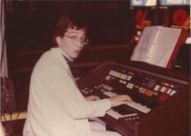 Earl MacDonald playing the organ at a Winnipeg Jets game, circa 1987