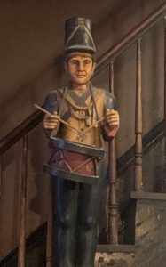 A statue of a drummer boy in Gabriel's Gate, a bar in Buffalo, NY